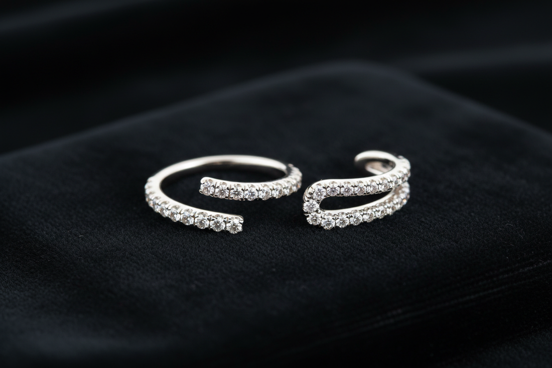 Pavé and micro-pavé diamond ear cuffs on black velvet