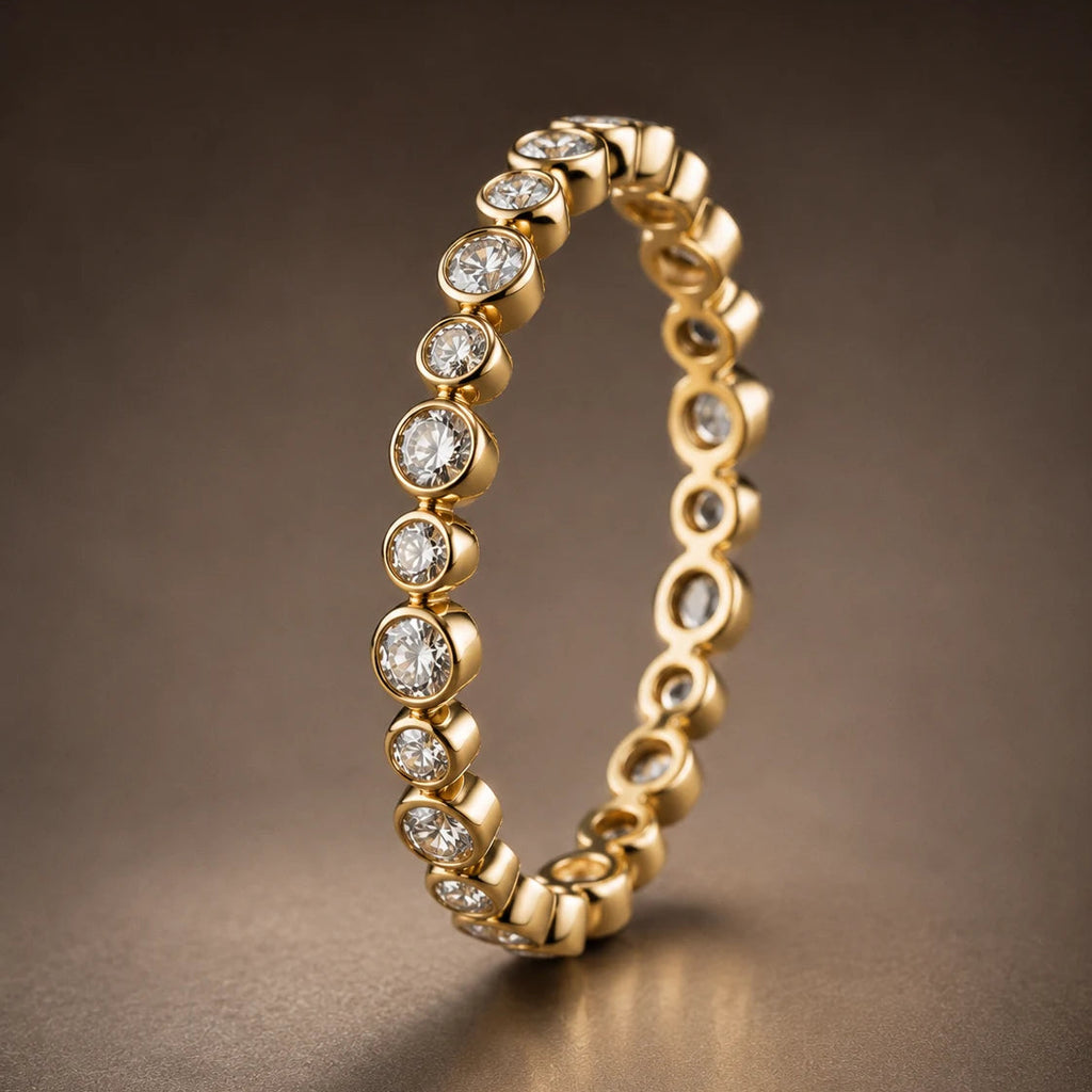 18K yellow gold bezel-set diamond full eternity wedding band — Orbit Eternity Band with alternating round brilliant diamonds and gold orbs, by JewelryRich Fine Jewelry