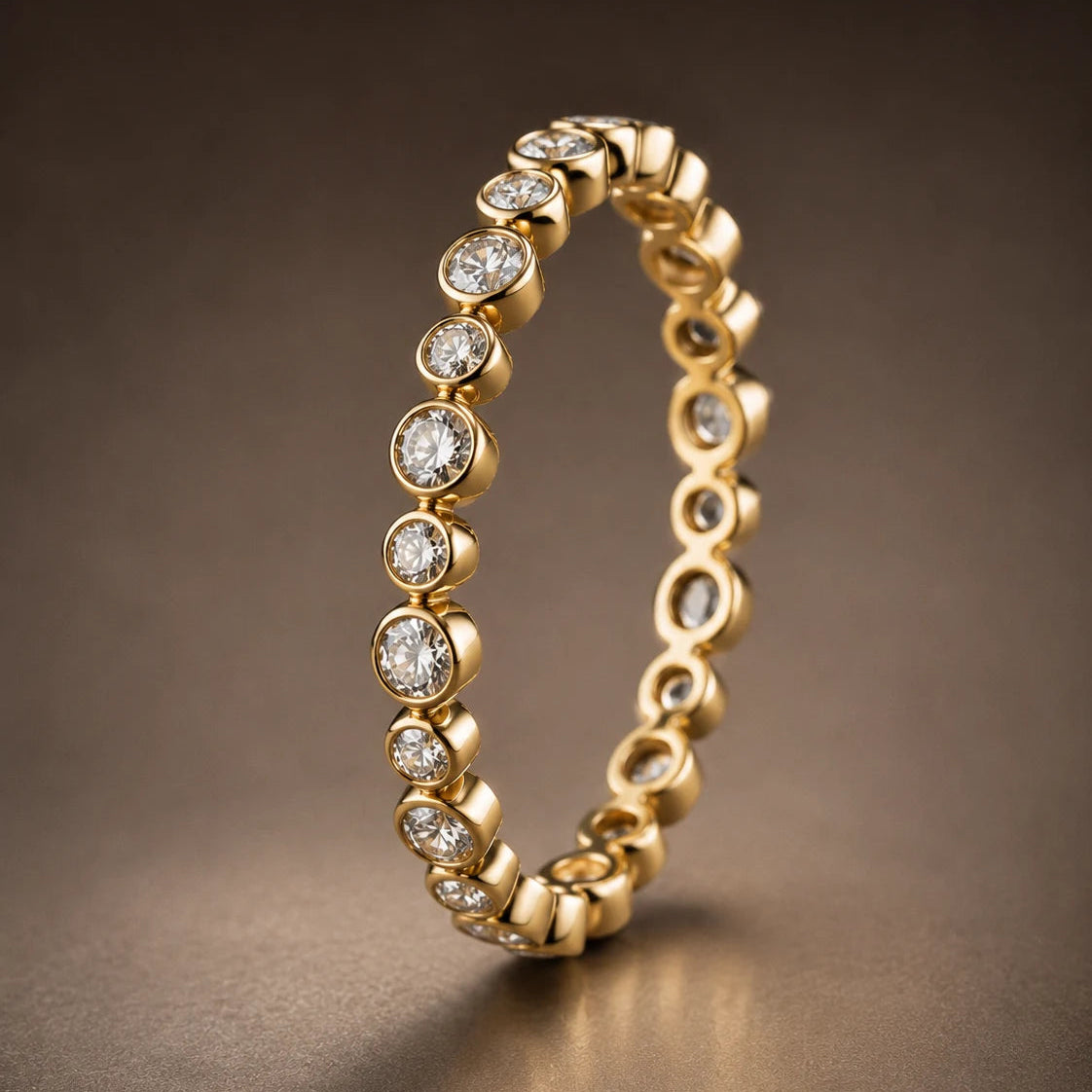 18K yellow gold bezel-set diamond full eternity wedding band — Orbit Eternity Band with alternating round brilliant diamonds and gold orbs, by JewelryRich Fine Jewelry