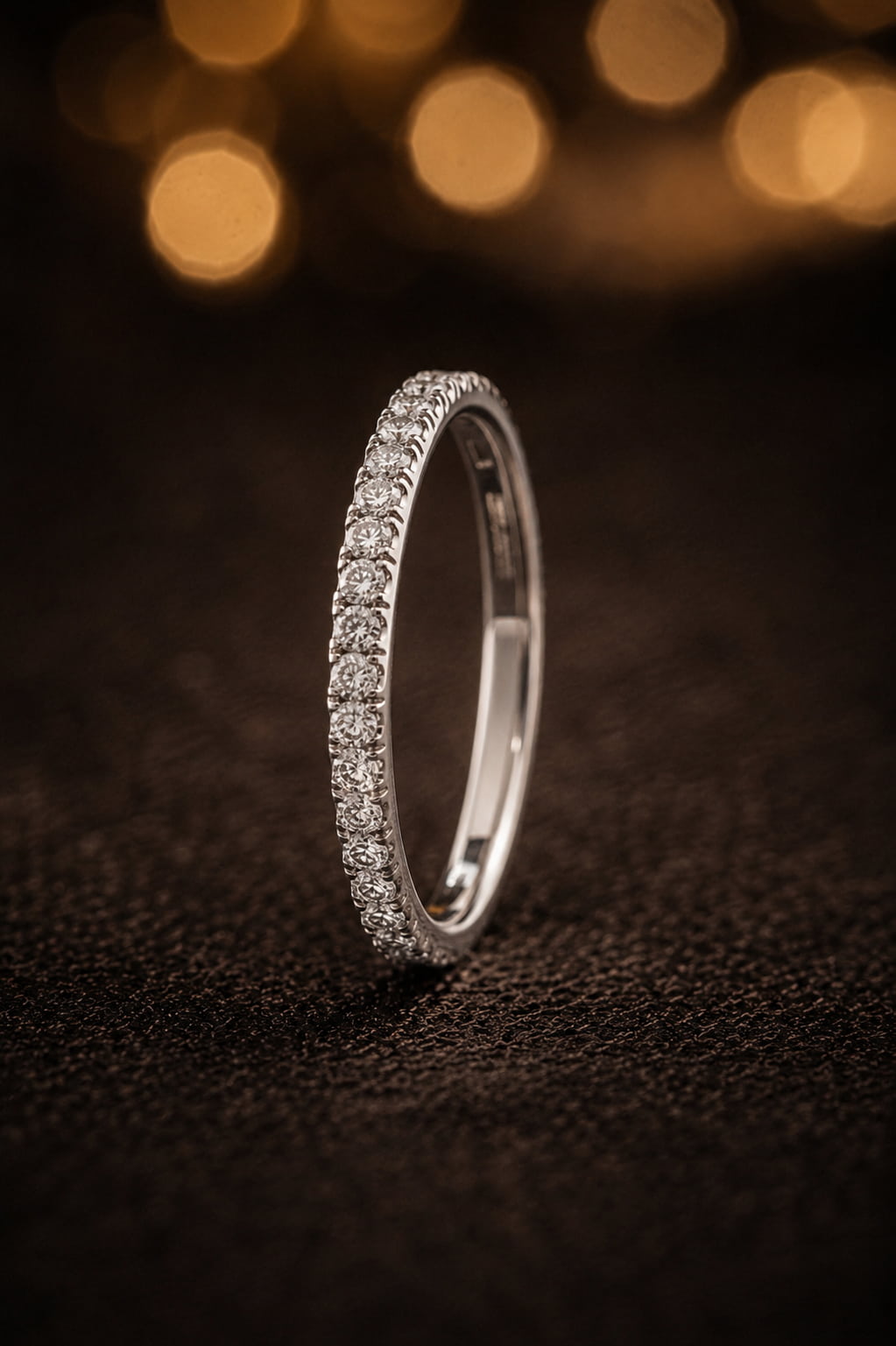 18K white gold thin minimal micro-pavé diamond wedding band with brilliant-cut GIA certified diamonds, dark luxury flat lay, JewelryRich