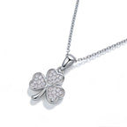 White gold clover diamond pendant necklace – close-up of pavé setting