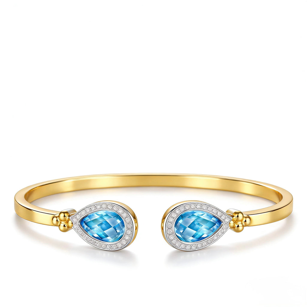 Teardrop Duet Cuff 18K Yellow Gold bangle with Swiss Blue Topaz and pavé diamond halo – front view