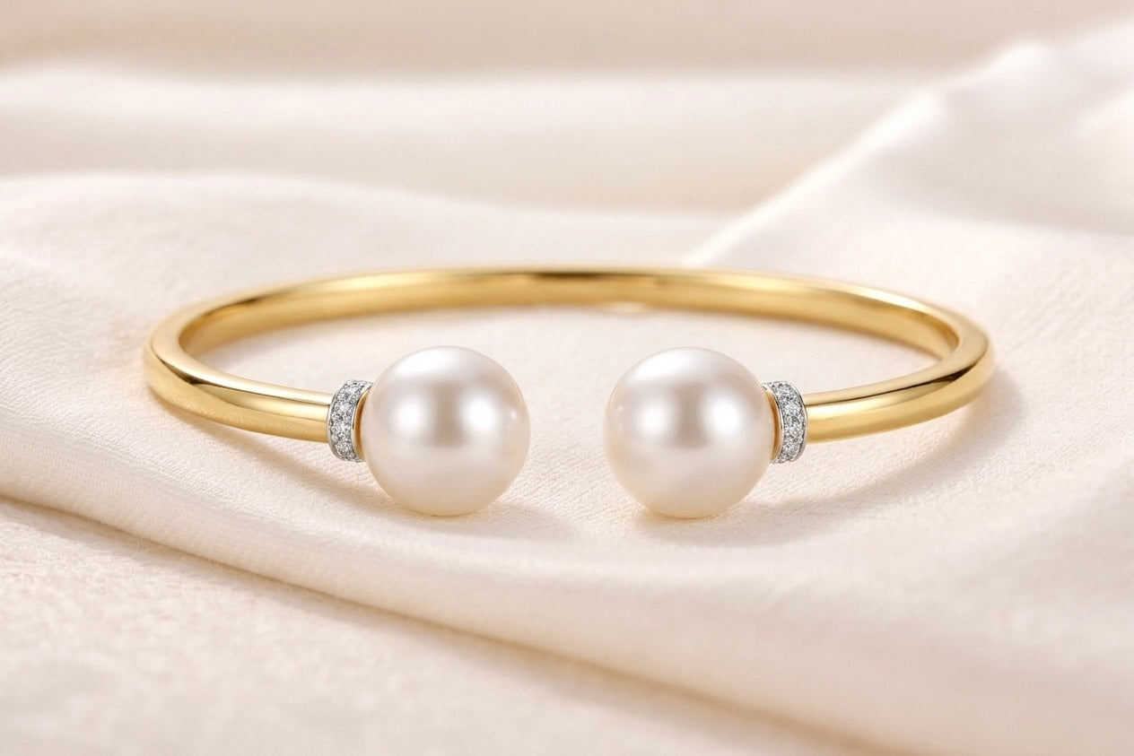 Pearl Duet Cuff 14K Yellow Gold two freshwater pearls with pavé diamond rondelle collar – flat lay on fabric