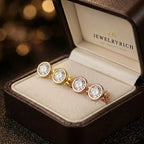 Bezel-set diamond stud earrings in yellow gold, white gold, and rose gold displayed in JewelryRich gift box