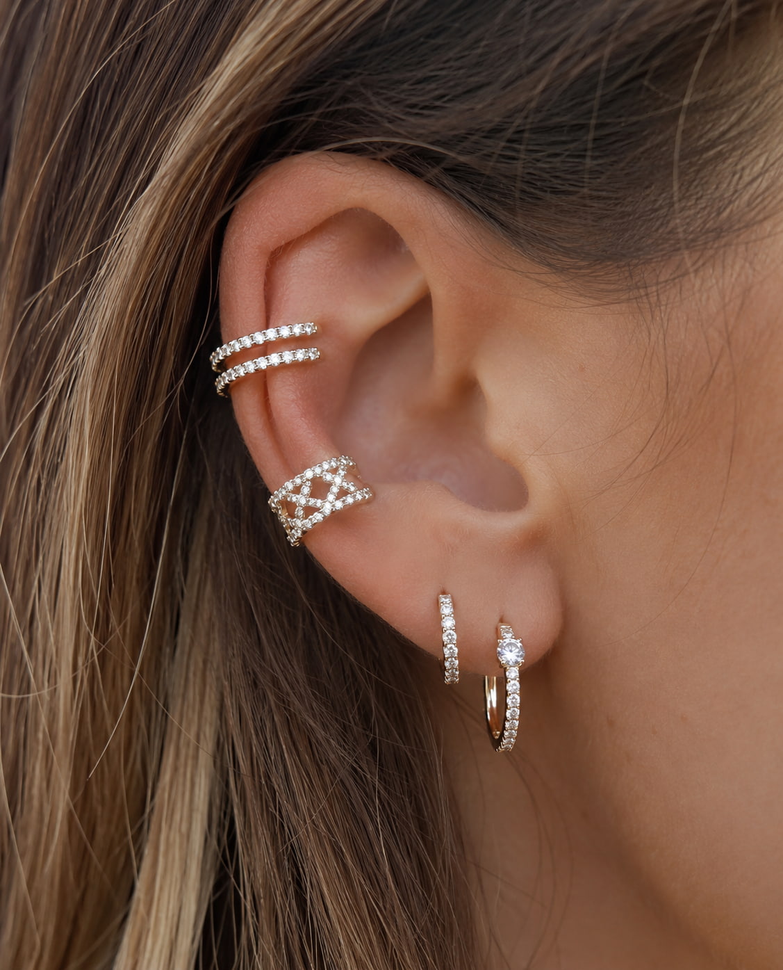 Diamond pavé double row ear cuff in 18K yellow gold worn on ear – no piercing required, elegant stacked look | JewelryRich