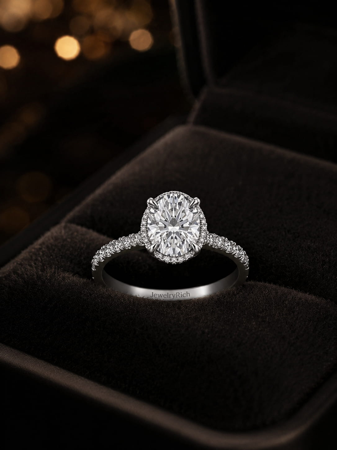Hidden halo oval diamond engagement ring in black velvet jewelry box, 18K white gold, brilliant micro-pavé halo setting, GIA certified, JewelryRich