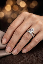 Oval solitaire diamond engagement ring with pavé band bridal set worn on hand — 18K white gold, JewelryRich