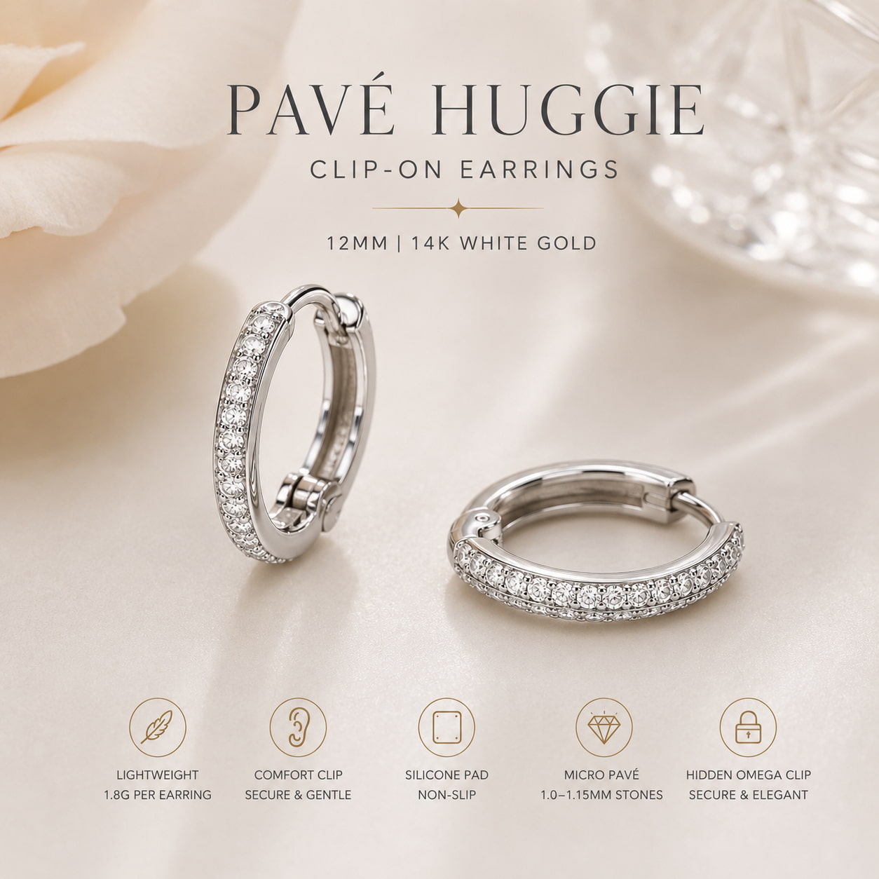 Pavé huggie clip-on earrings in 14K white gold with double-row micro pavé diamond setting, product shot on white background, JewelryRich